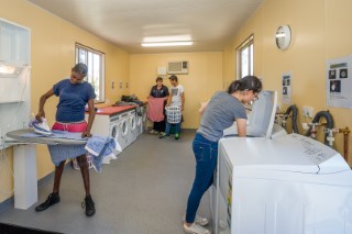 Boarders doing laundry