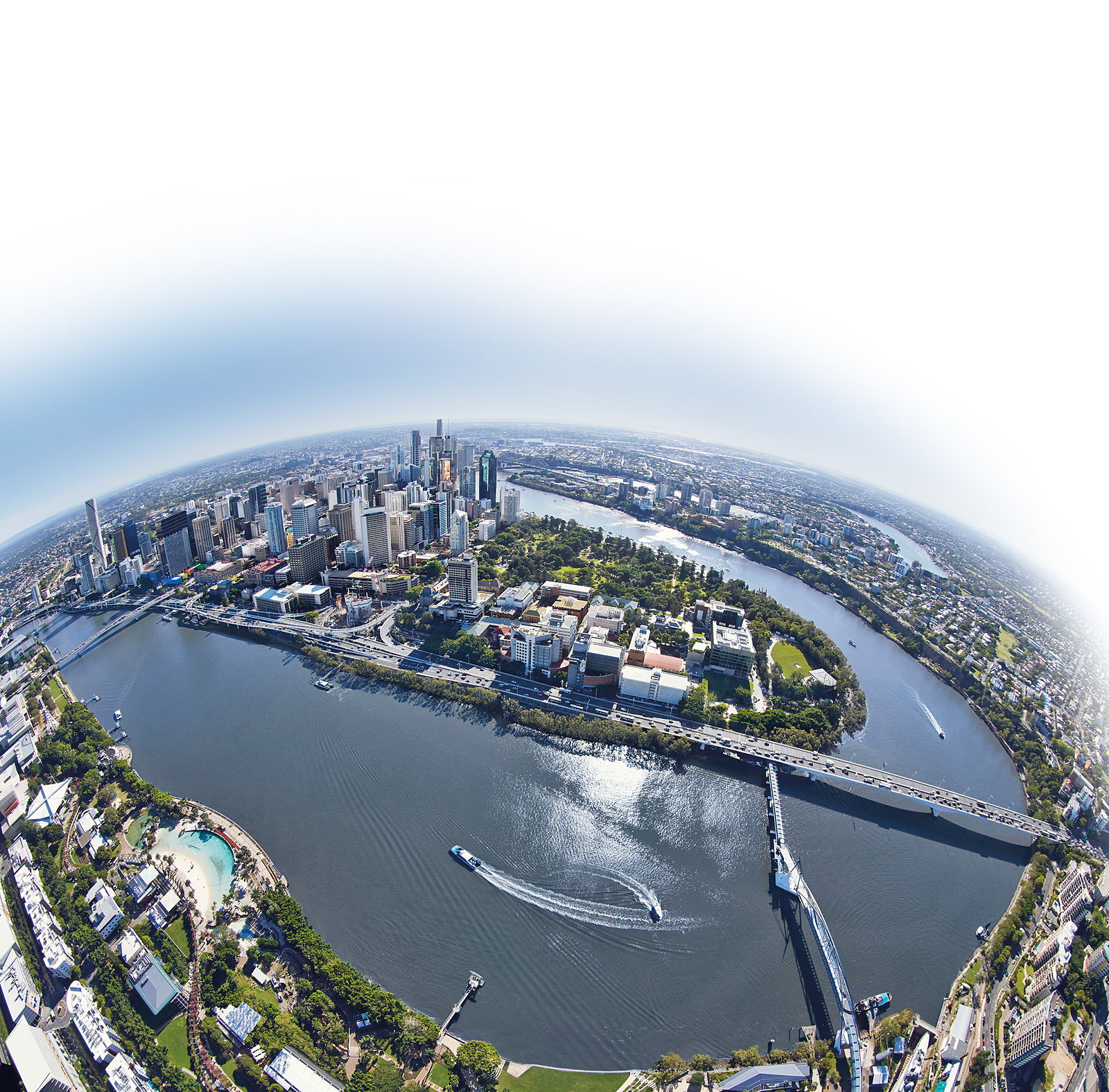 Aerial fisheye view of central Brisbane, the Brisbane River curving through the city, and South Bank parklands