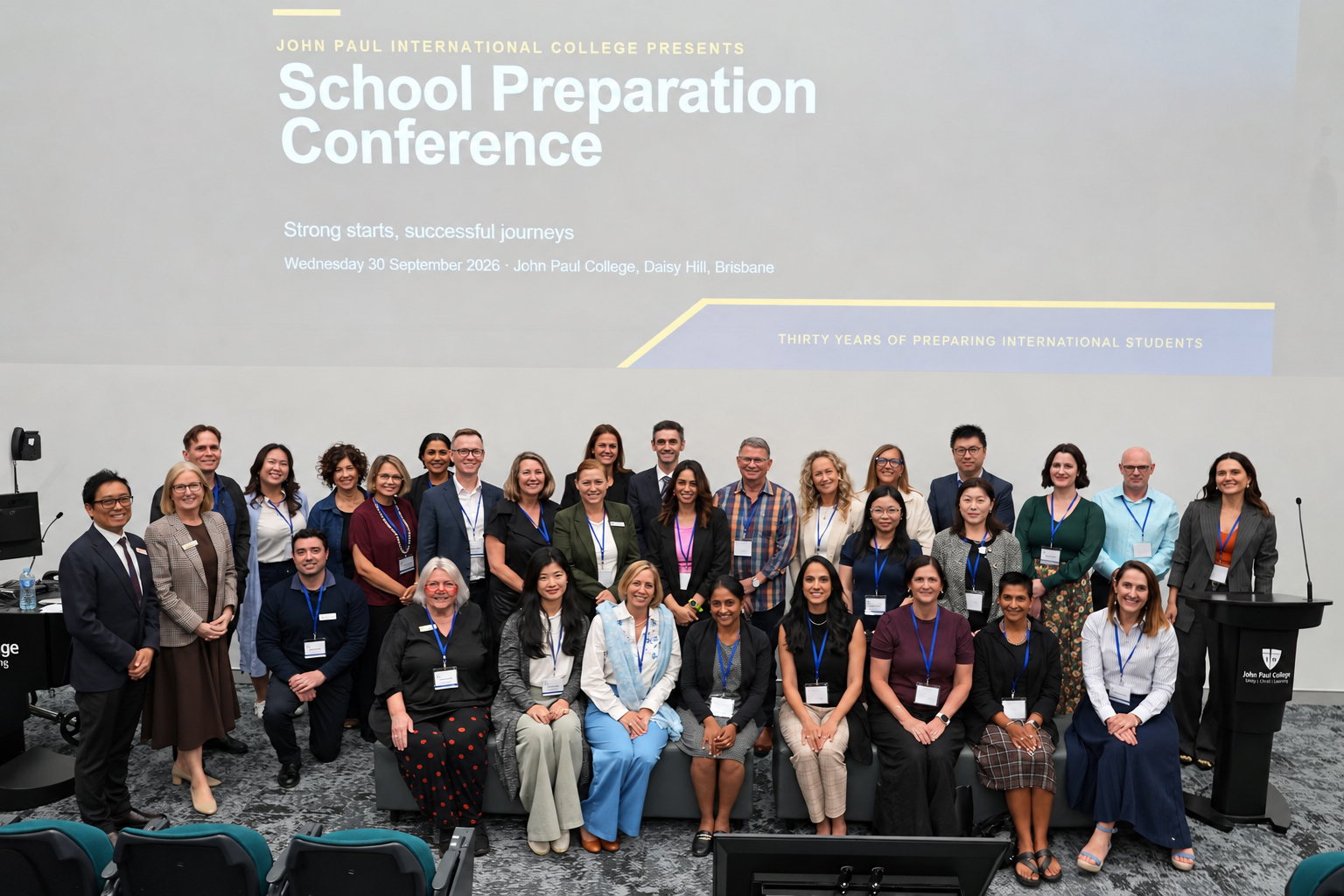 Delegates and presenters gather for a group photo at the School Preparation Conference 2026