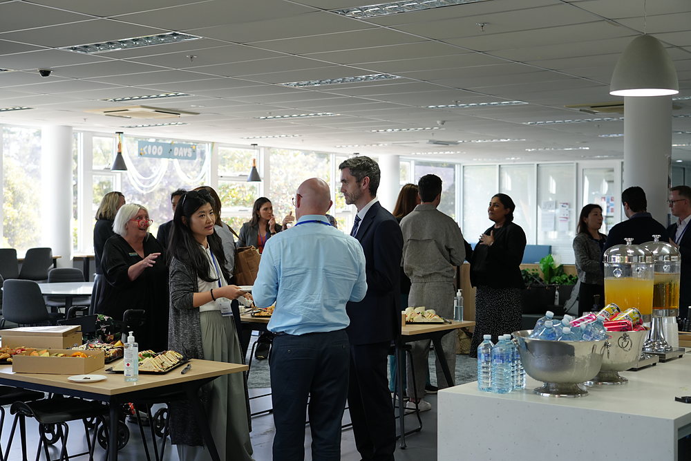 Delegates networking over food and drinks