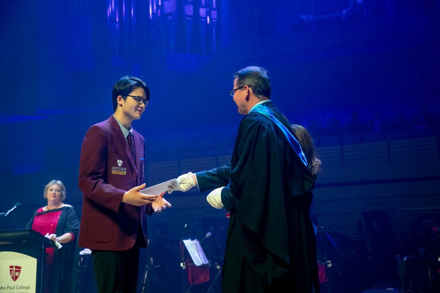 Nam Nguyen accepting his award on stage