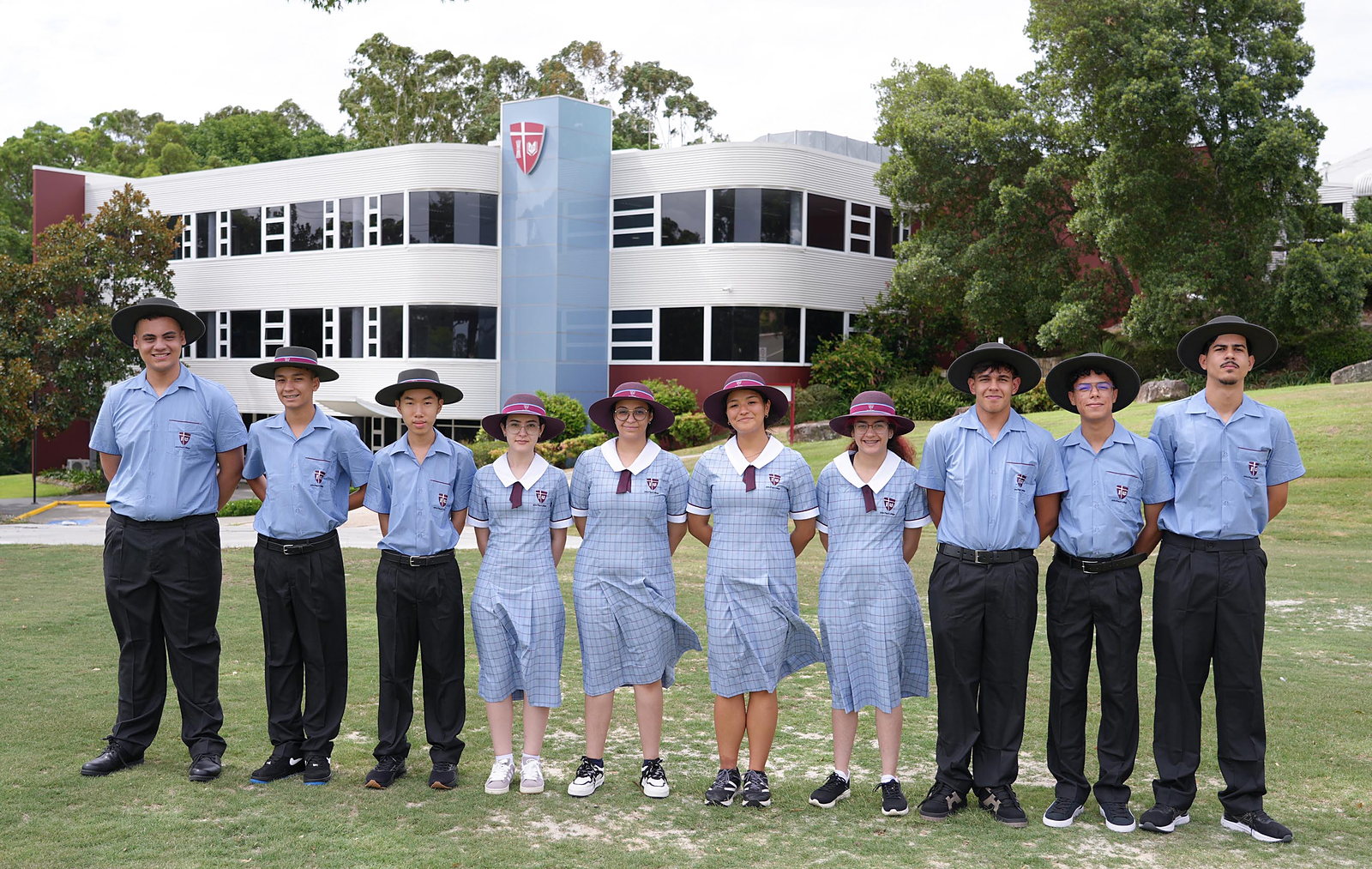 Brazilian scholarship students in John Paul College uniform on the Daisy Hill campus