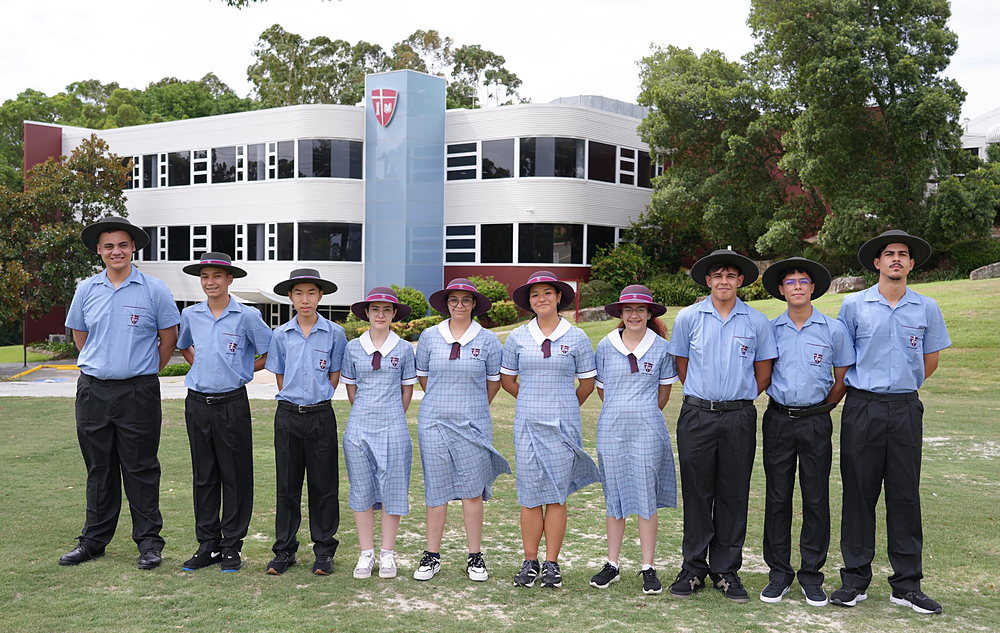 Brazilian scholarship students in John Paul College uniform on campus