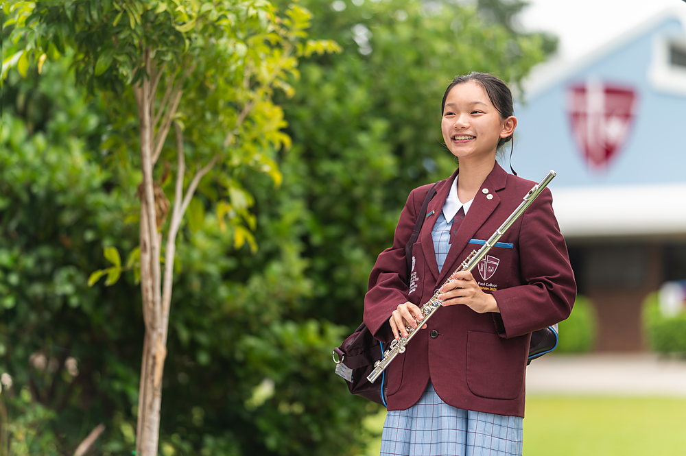 An international student working alongside classmates in a JPC lesson